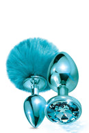 CONJUNTO DE PLUGS METÁLICOS COM POMPOM E JÓIA