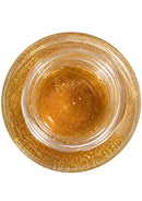 ÓLEO CORPORAL COM BRILHO DOURADO