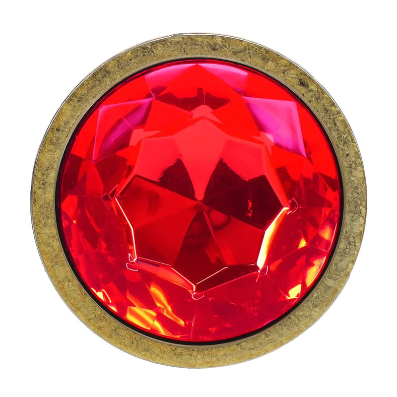 KIT DE 3 PLUGS DOURADOS COM PEDRA VERMELHA