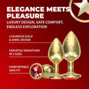 KIT DE 3 PLUGS DOURADOS COM PEDRA VERMELHA