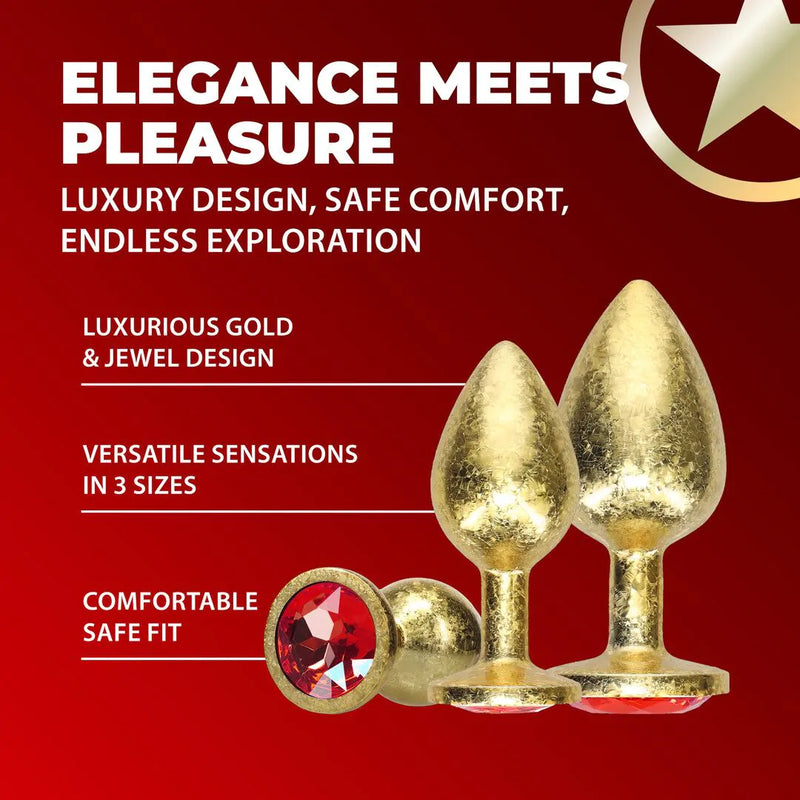KIT DE 3 PLUGS DOURADOS COM PEDRA VERMELHA